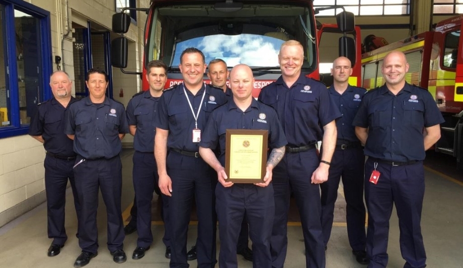 Firefighter Adrian Sargent Presented With A Certificate Of Commendation From TWFRS Chief Fire Officer
